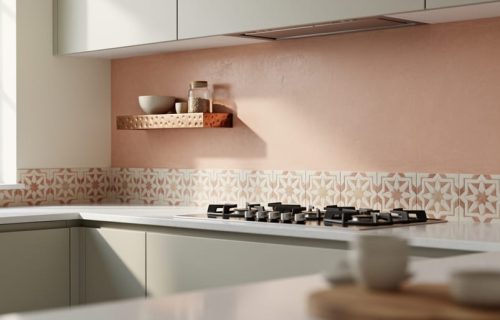 “Tadelakt lime plaster backsplash in a modern kitchen with Moroccan-style ceramic accents and copper/brass hammered metal detail.”