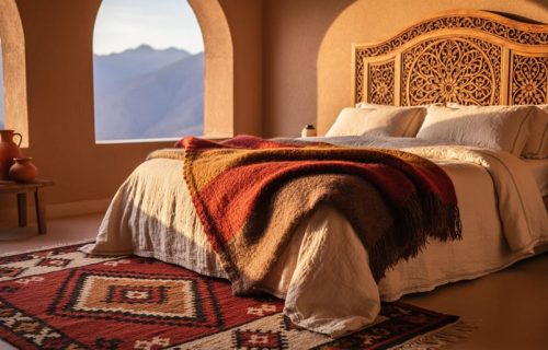 Cozy Atlas Mountains-inspired Moroccan bedroom corner with layered Berber textiles, a carved cedar headboard, and warm terracotta and ochre decor.